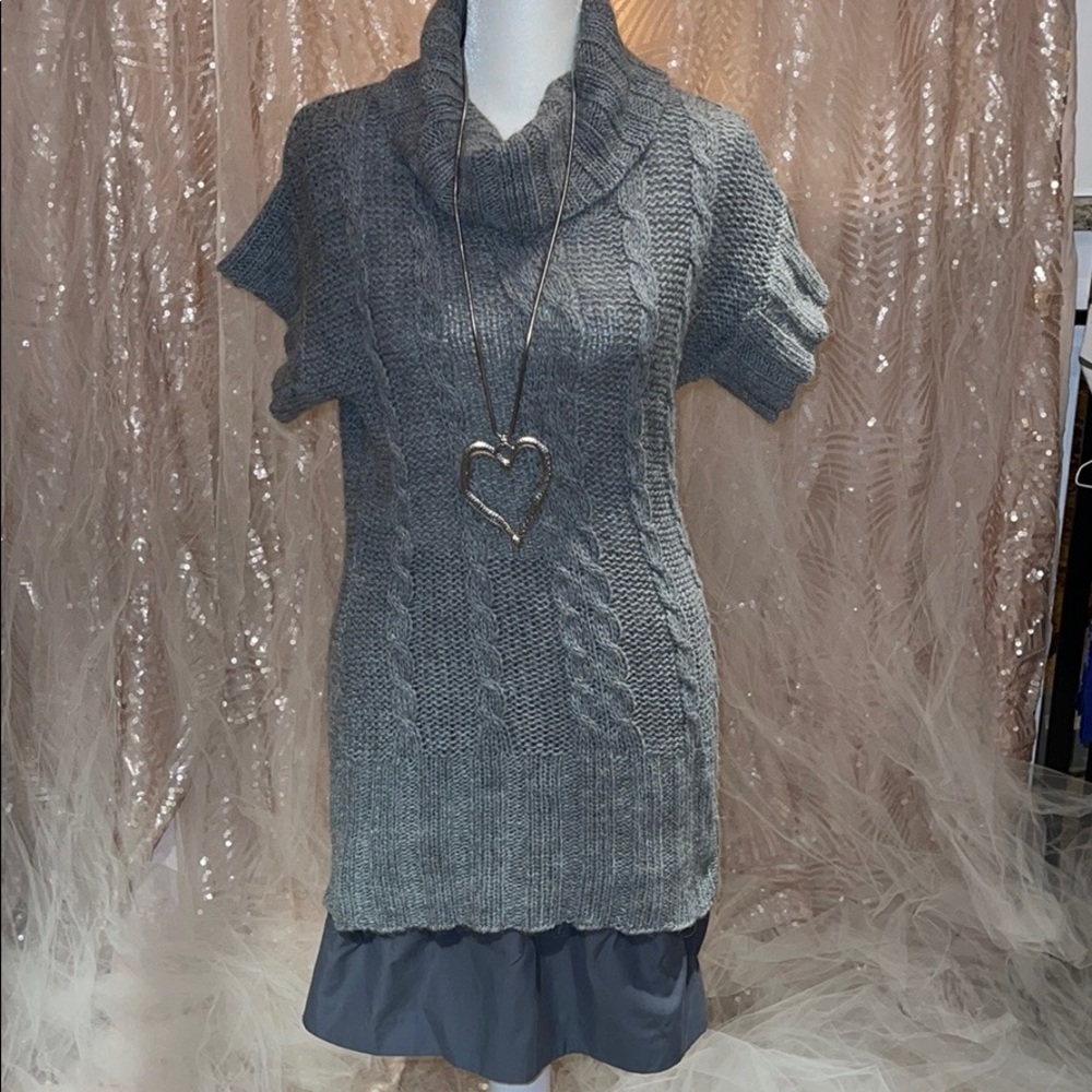 Grey short sleeve cowl neck sweater.